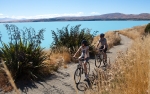 Cycle through Lake Tekapo