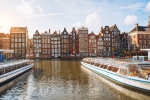 Glide through Amsterdam's iconic canals