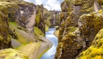 Fjaorargljufur Canyon, with breathtaking glacial-carved gorge with moss-covered cliffs